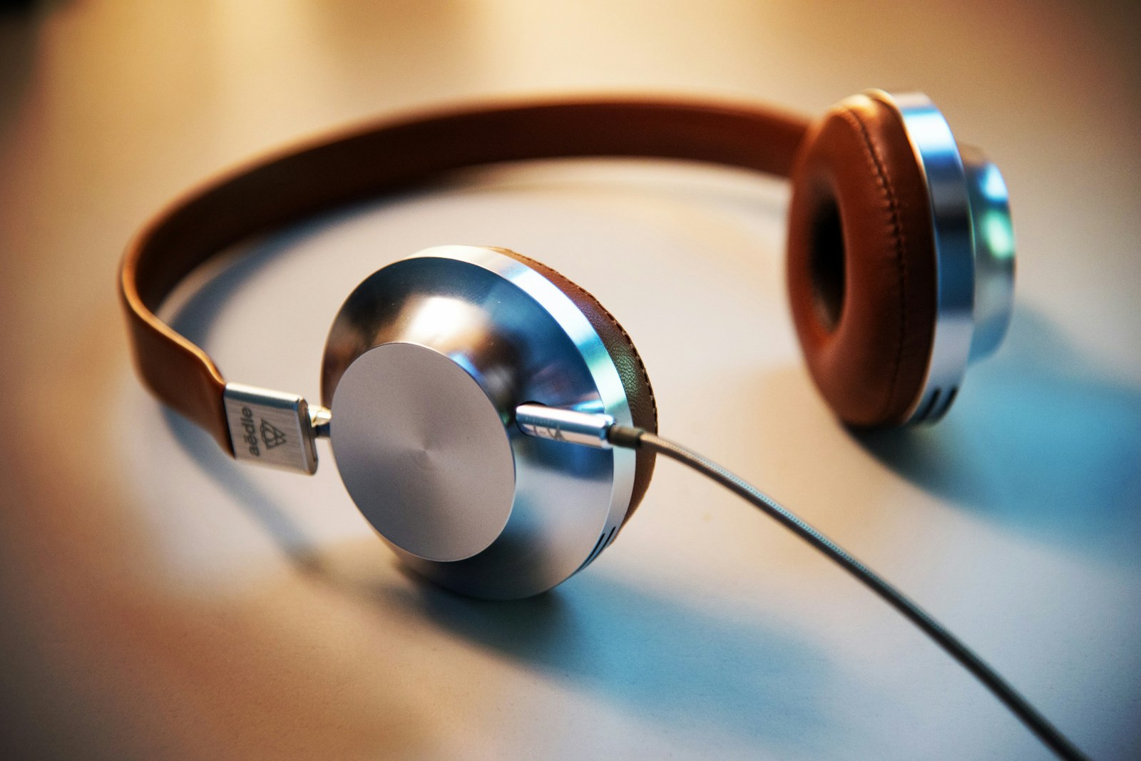 Headphones resting on a bright surface